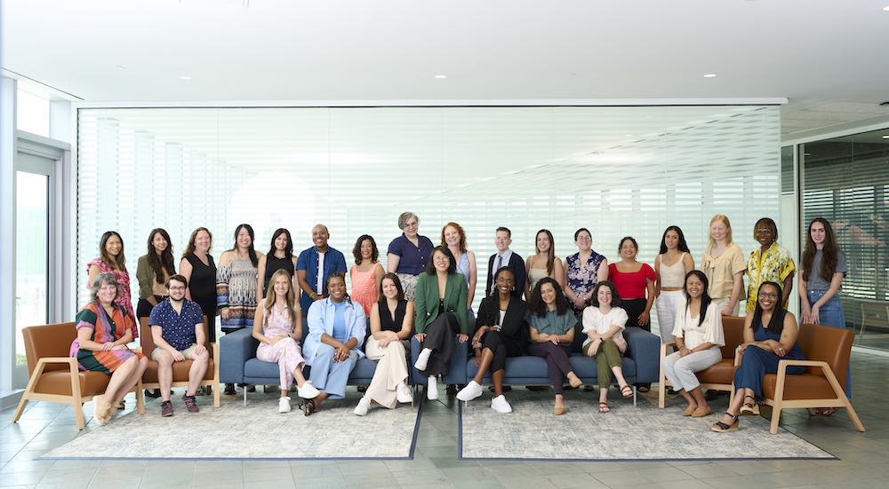 Julia B. Chan poses with The 19th’s newsroom staff during the 19th’s annual retreat, in New Orleans, in June 2024. Photo by Jeremy Tauriac for The 19th